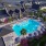 a swimming pool surrounded by houses